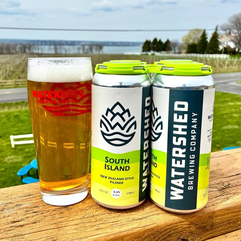South Island New Zealand Pilsner cans and glass
