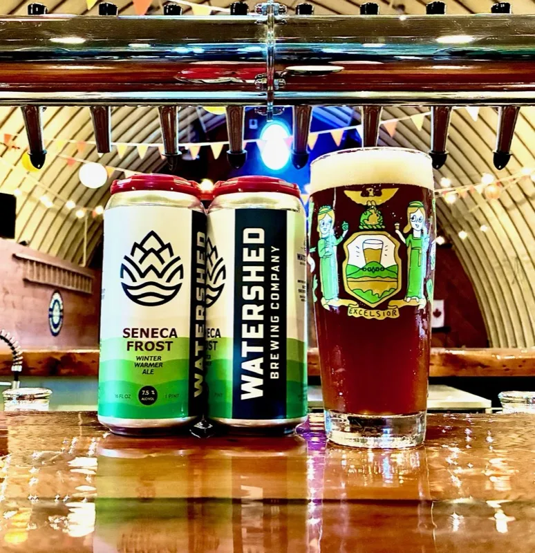 Seneca Frost spiced ale cans and glass at Watershed